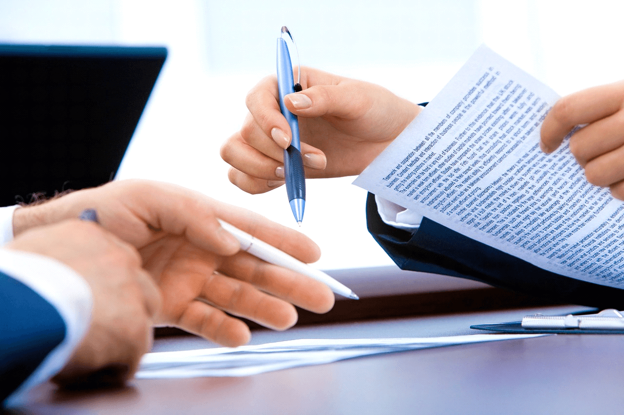 A business contract template outlines terms for various agreements between parties