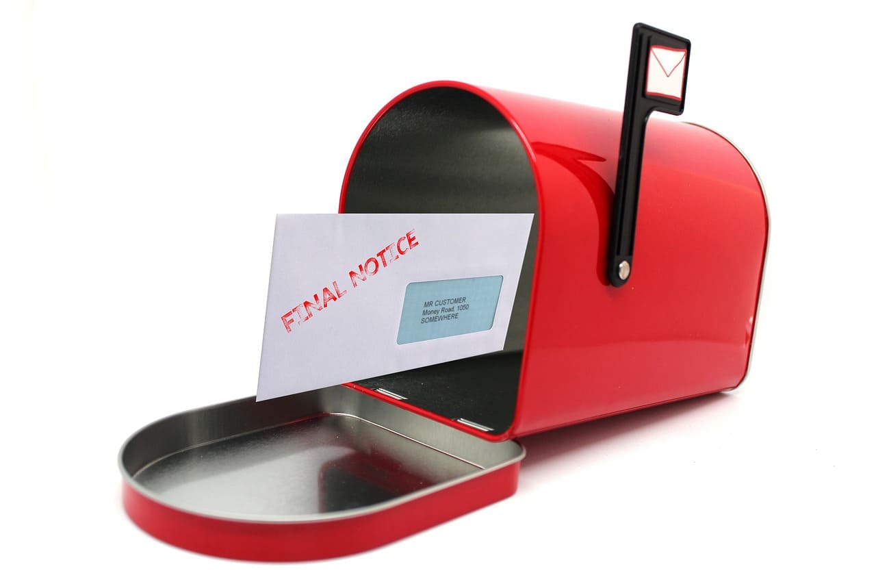 red-mailbox-with-a-final-notice-in-it