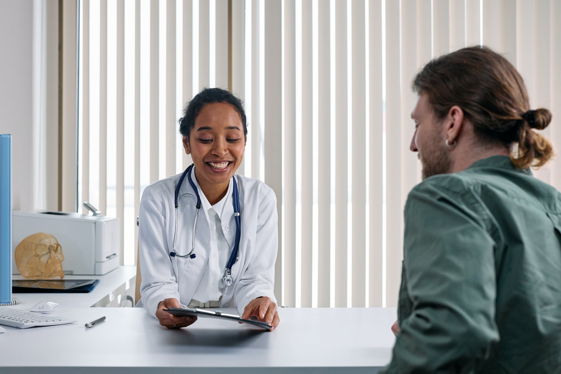 doctor consulting patient for the doctors note