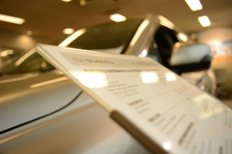 clipboard-in-front-of-a-vehicle-on-display