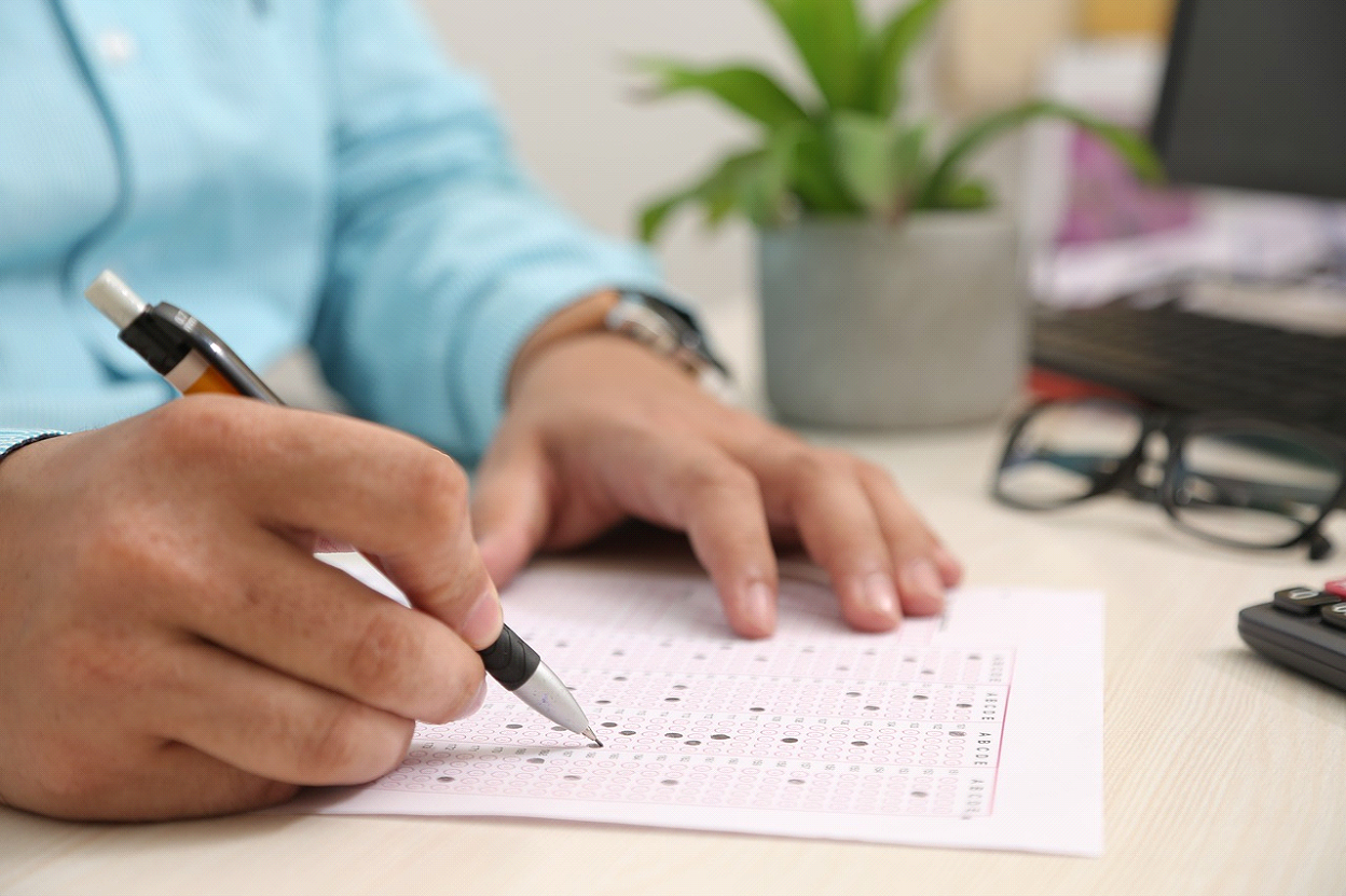 a man filling out Indiana Power of attorney form